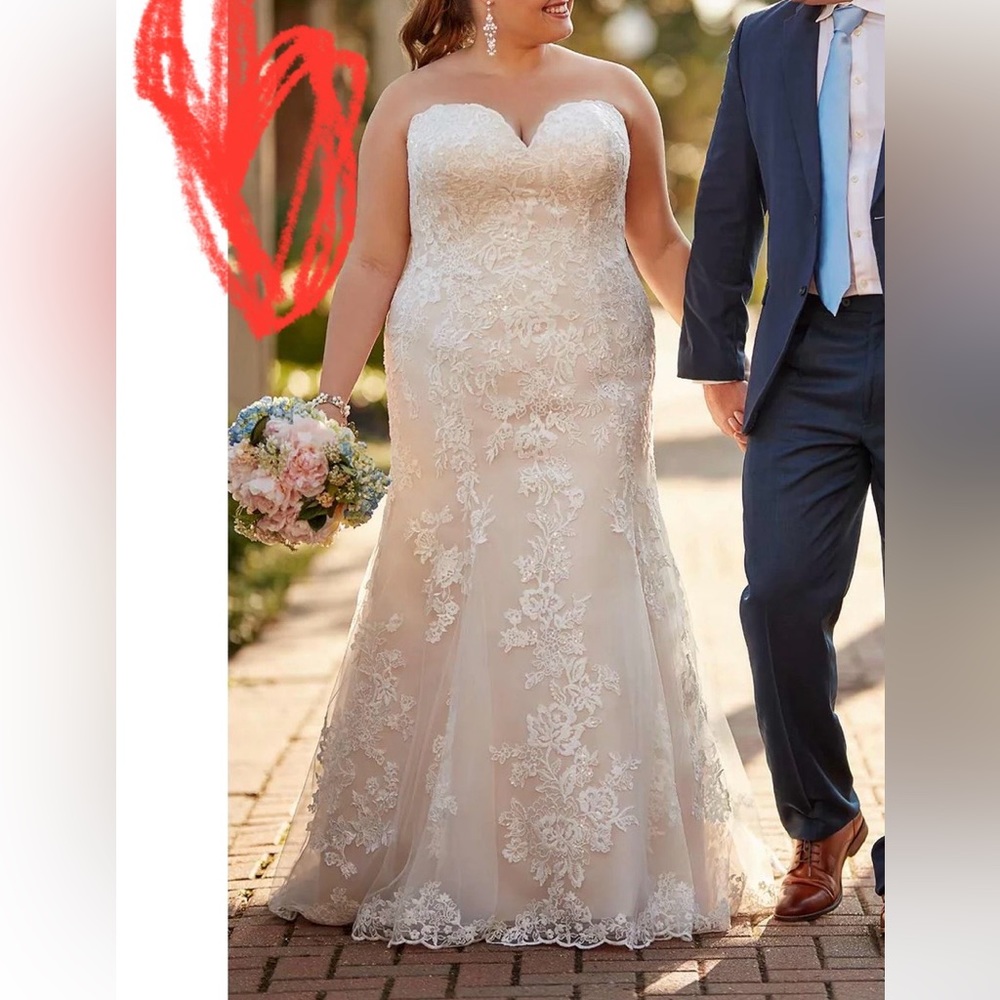 Stella York wedding dress. New, in garment bag, still has original tags on it!